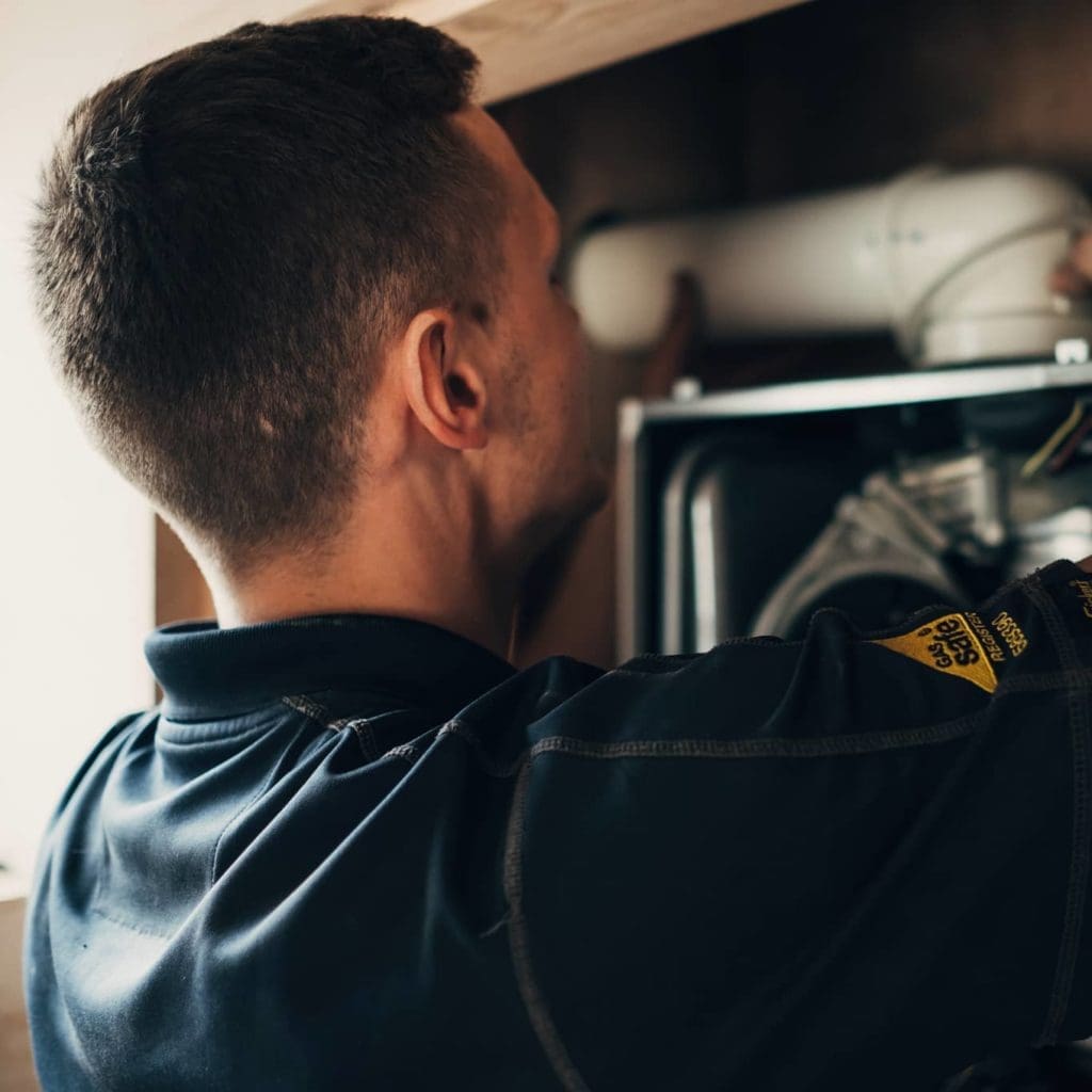 Luke, one of our plumbers at work in Holmes Chapel Cheshire